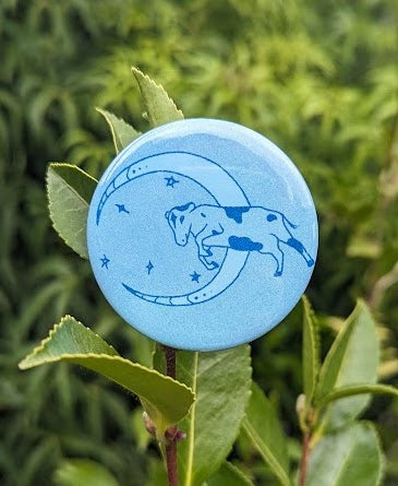 cow jumping over moon button