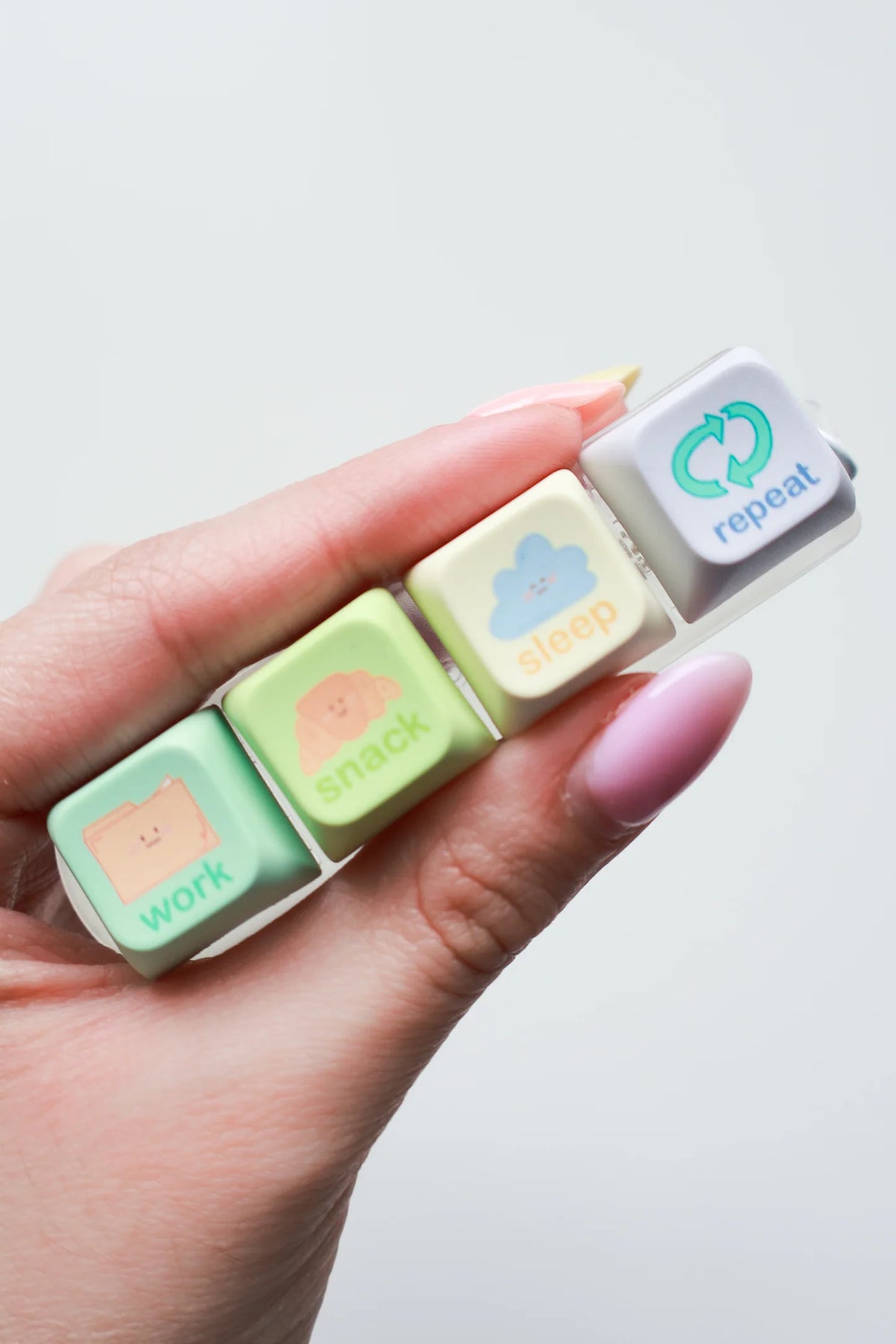 Neutral Routine keyboard fidget keychain