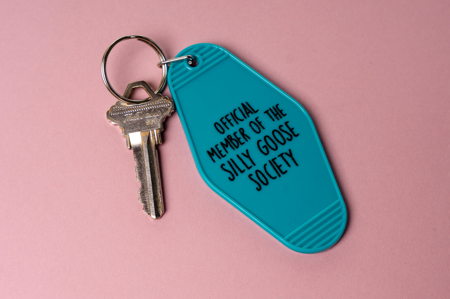 silly goose motel keychain