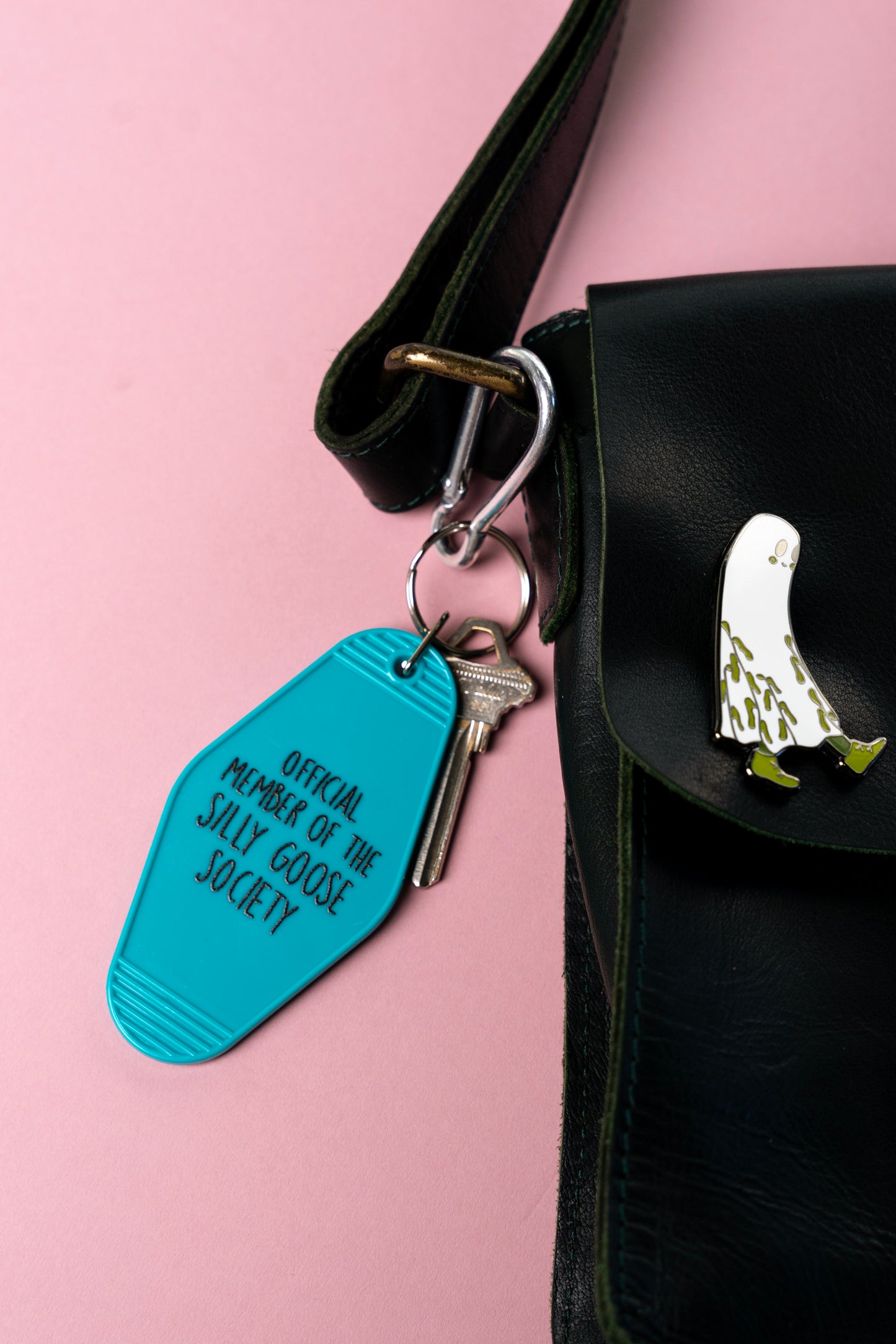 silly goose motel keychain