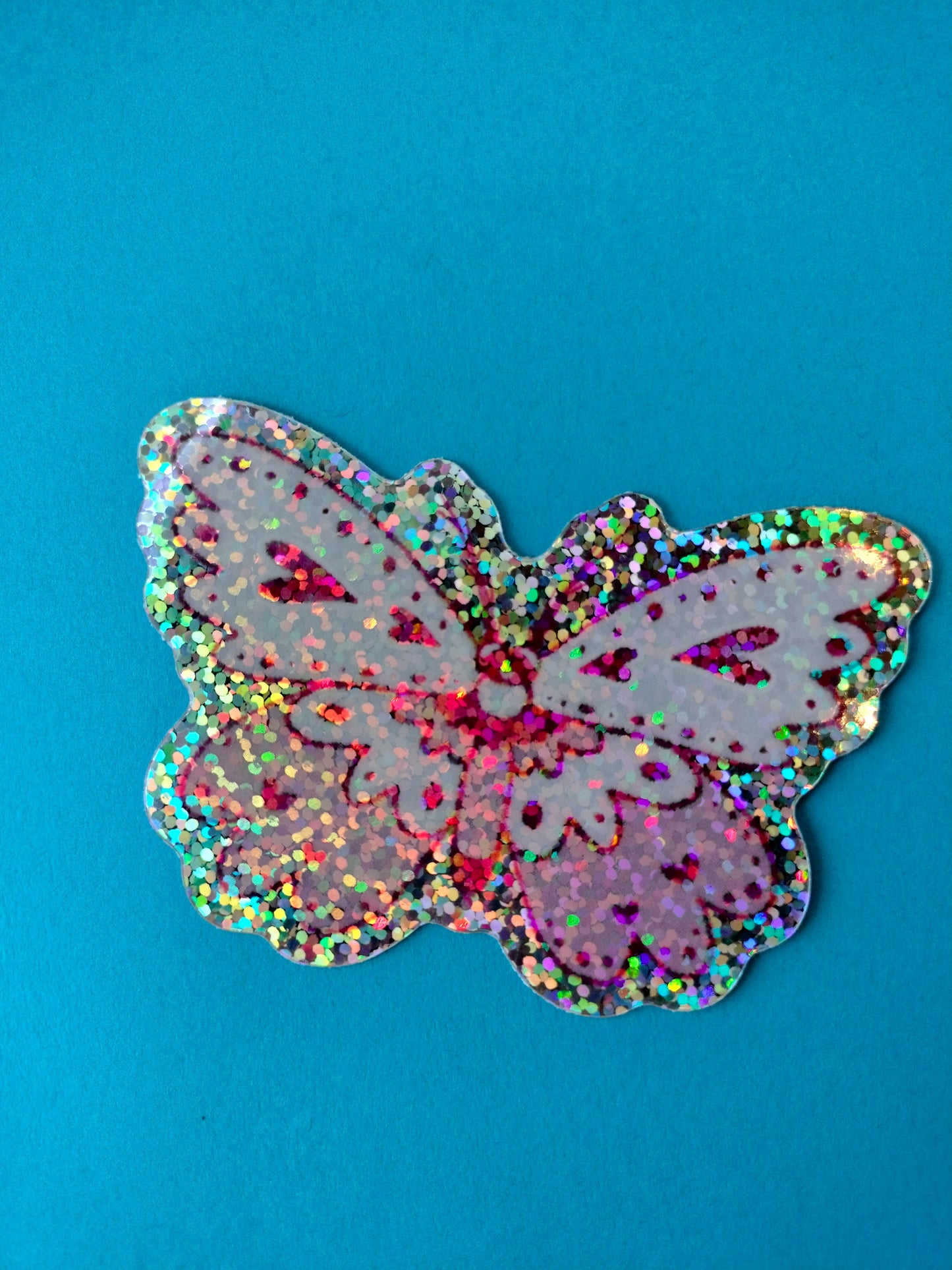 glittery celestial moth sticker