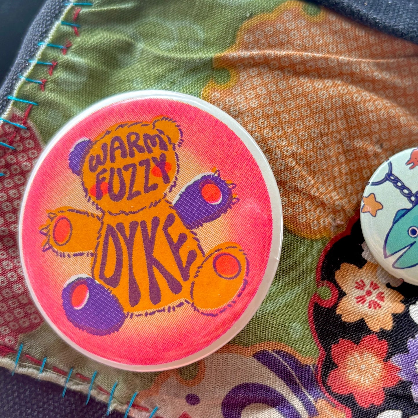 Warm Fuzzy Dyke button